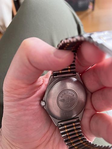 Satovi: Breitling Aerospace, dvobojni (čelik/titan sa zlatnim akcentima) — 2