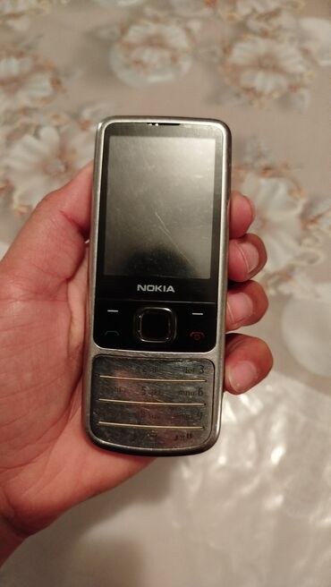 nokia 6500 qiymeti: Nokia 6700 Slide, rəng - Boz, Düyməli