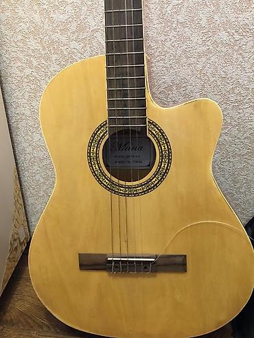 gitara sekilleri: Klassik akustik gitara – Silvero brendi, kəsik korpuslu (cutaway) — 1