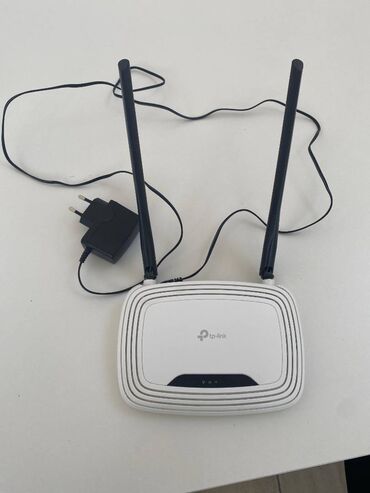 Modemlər və şəbəkə avadanlıqları: Gəncə TP-link TL-WR841N router modem 300 mbps 2 ay civari istifadə