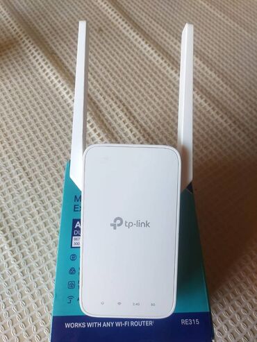 wifi modem qiymətləri: Wifi guclendirici 5 G ni destekleyir.oturme sureti 1000+ TP-Link