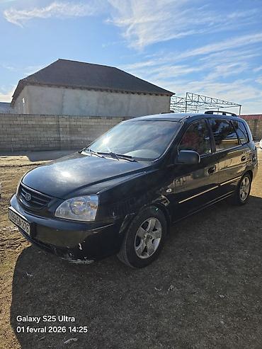 kia r17: Kia Carens, qara rəng, 5 qapılı MPV/miniven. - dizel mühərriki, ön — 10
