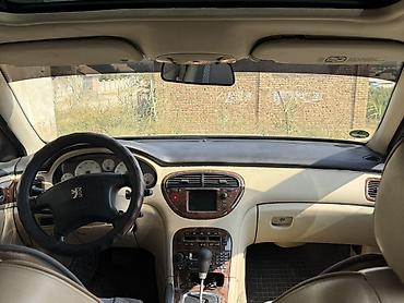 discovery sport: Peugeot — интерьер седана бизнес‑класса с бежевым салоном и — 4