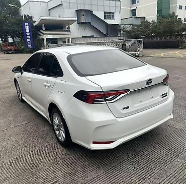 matiz 2006: Toyota Corolla: 2023 г., 1.8 л, Вариатор, Гибрид, Седан — 6
