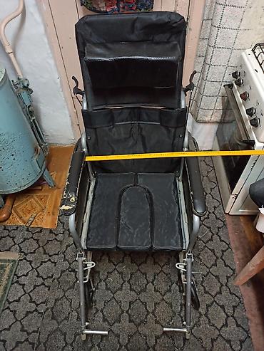 Инвалидные коляски: Инвалидная коляска с санитарным вырезом и ведром (комба-туалет) — 1