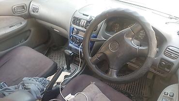 bmw 5 e39: Nissan Sunny: 2002 г., Автомат, Бензин, Седан — 1