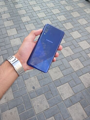 самсунг телефон: Samsung Galaxy A30s, 32 GB, rəng - Bənövşəyi, Düyməli, Barmaq izi, Face ID