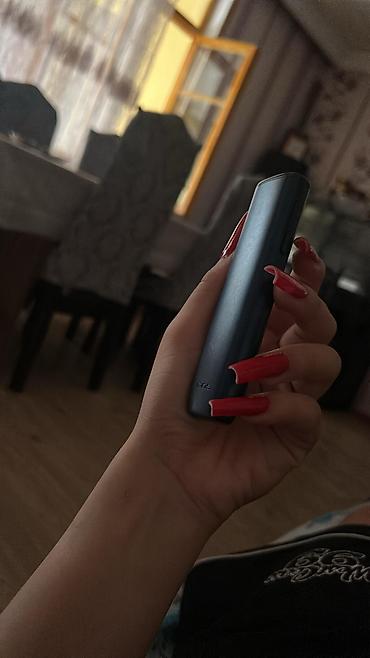 IQOS elektron tütün qızdırma qurğusu - Portativ, cibə yerləşən dizayn