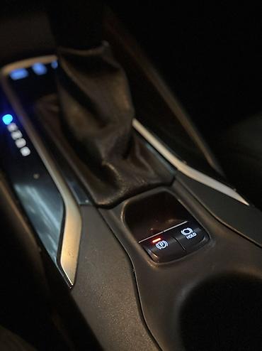 byd e6: Toyota Corolla: 2019 г., 1.8 л, Вариатор, Гибрид, Седан — 9