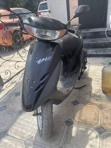 диски на опель зафира а: Черный скутер Honda Dio, разработанный для повседневных поездок