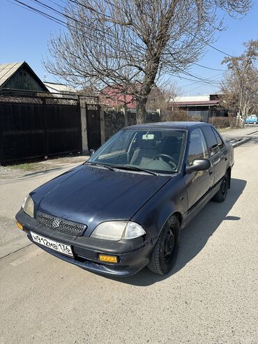 Suzuki: Suzuki Swift: 2002 г., 1.3 л, Механика, Бензин, Седан