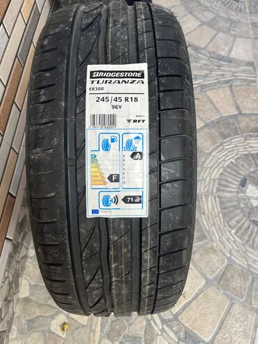 alman tekerleri: Yeni Şin Bridgestone 245 / 45 / R 18