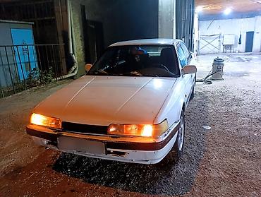 bmw e34 2 8: Mazda 626: 1988 г., 2 л — 2