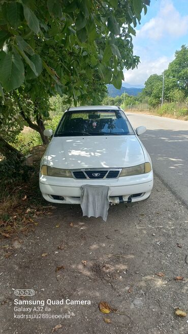 Daewoo Nexia: 1.5 л | 1997 г. Седан