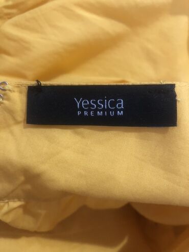 hicablı donlar: Brend: Yessica Premium (C&A) Model: Sarı rəngli yay paltarı -
