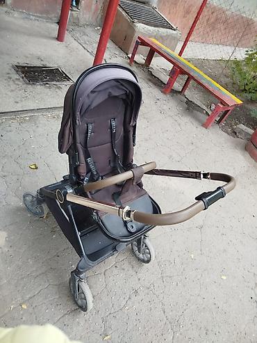 коляска ilovi: Прогулочная коляска Kidilo (надпись на сиденье) с поворотным блоком — 4