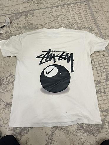 купить форму афганку: Белая футболка Stüssy x Nike с крупным графическим принтом. Состояние — 2