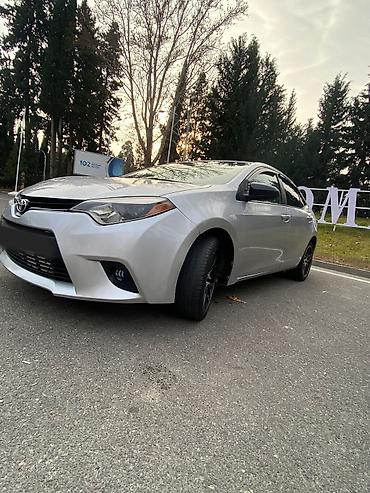 4 göz maşını: Toyota Corolla: 1.8 l | 2014 il Sedan — 1