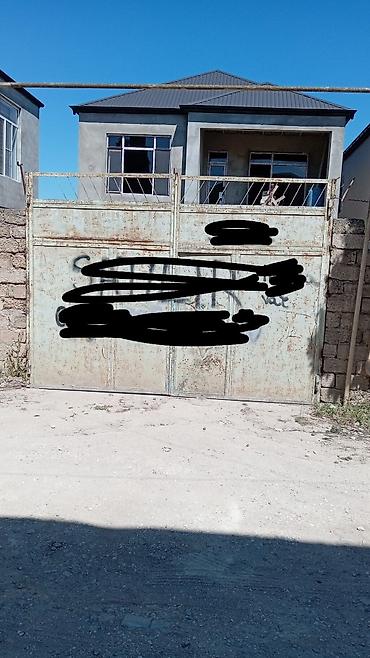 demir seyf qapi: Eni 4metr, hundurluyu 3metr darvaza, ünvan binə bolluq. Real aliciya — 2