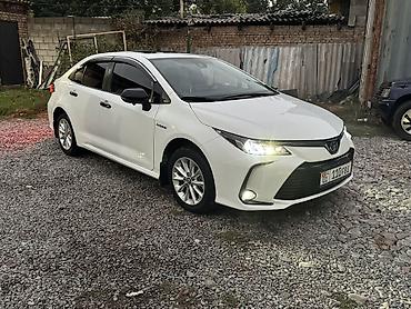 Toyota: Toyota Corolla: 2022 г., 1.8 л, Вариатор, Гибрид, Седан — 6