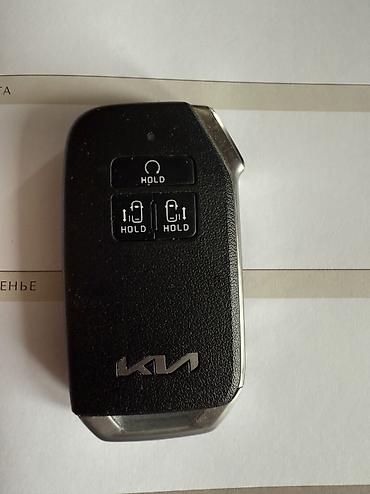 корпус ключа: Продаю ключ для KIA Carnival 3г с кожанным чехлом 
цена 12000 сом — 1