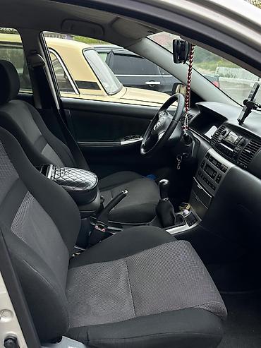 Toyota: Toyota Corolla hatchback (E120), gümüşü rəng. - Kuzov: 5 qapılı — 13