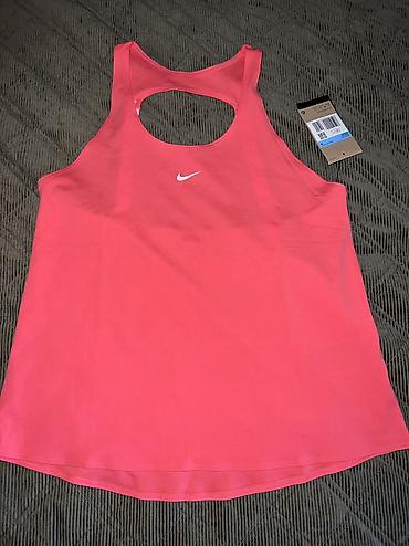 aksa: Nike Pro Women's Dri-FIT Tank Top vel. XS, M 
Recycled Materials
IB — 5