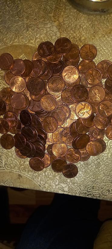 Sikkələr: 150 ədəd ABŞ 1 senti - ABŞ-da, əmək haqqının yüksək olması və kard — 1