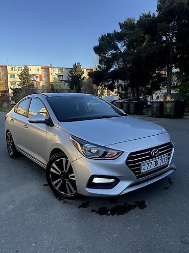 accent: Hyundai Accent sedan – gümüş rəng Əsas xüsusiyyətlər: - Kuzov: 4 — 2