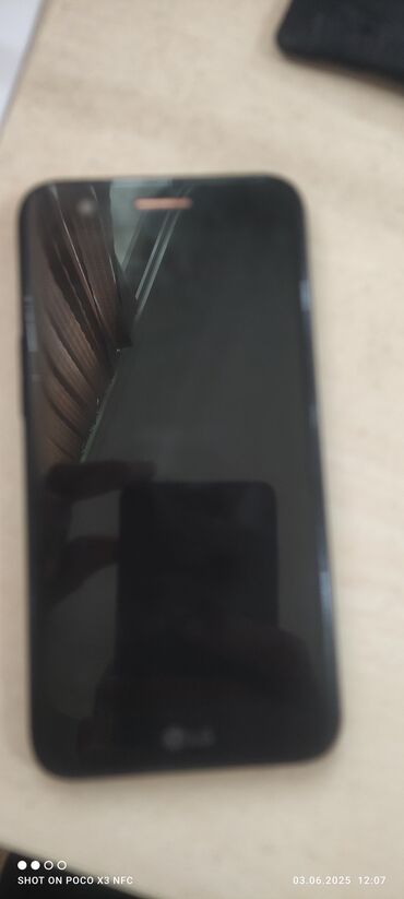 smart telefonlar: LG K10, rəng - Qara