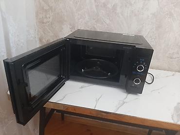 midea: Midea mikrodalğalı soba – kompakt və funksional masaüstü model — 4