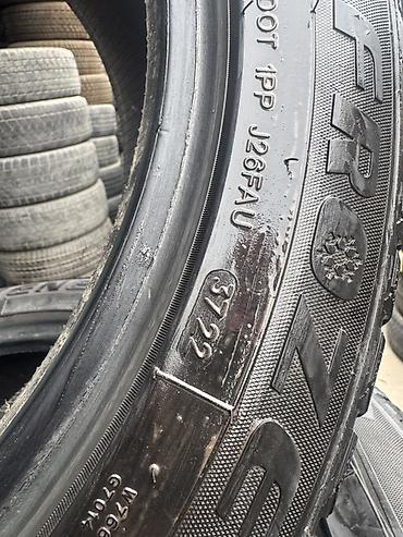po: Зимние шины Toyo Garit GIZ, размер 235/50 R18. Маркировка: - 235/50 — 2