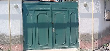 hasar dəmir: Metal darvaza – ikitaylı, klassik panel naxışlı dizayn. - Material — 1
