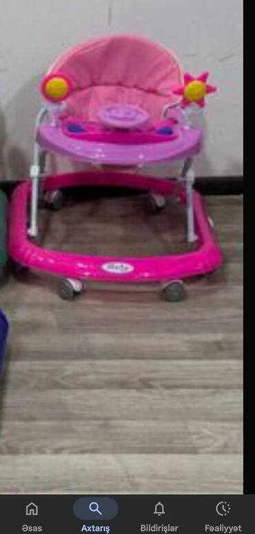 çəliklər: Uşaq gəzdiricisi (baby walker) – çəhrayı rəngdə. Xüsusiyyətlər: -