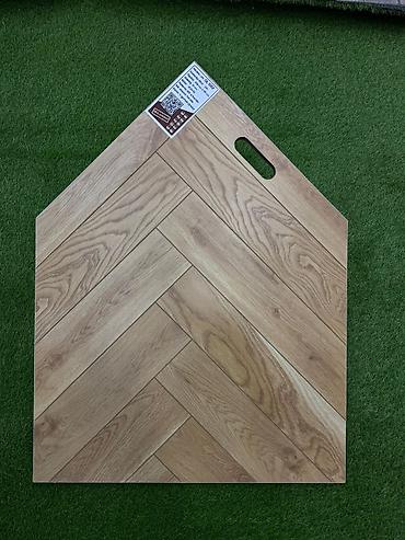 lamina: Laminat. 33 klass. Çin istehsalı. 12 MM qalınlıq. Suya qarşı davamlı — 3