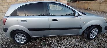 Kia: Kia Rio hatchback - Gümüş rəngli kuzov, 5 qapı - Mexaniki sürətlər — 1