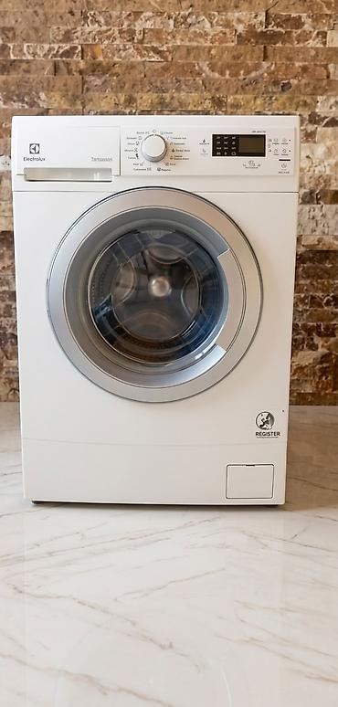 dikiş masini: Electrolux paltaryuyan maşın – TimeManager seriyası, ön yükləməli — 1