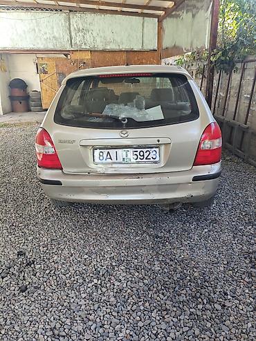 m5 e60 v10: Mazda 323: 2000 г., 1.6 л, Автомат, Бензин, Хэтчбэк — 8