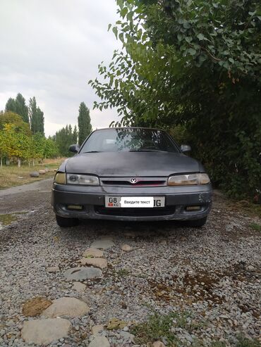 мазда 1992: Mazda Cronos: 1992 г., 2 л, Механика, Бензин, Седан