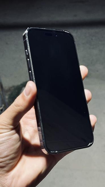 a 13: IPhone 14 Pro, Б/у, 128 ГБ, Deep Purple, Чехол, 80 % — 2
