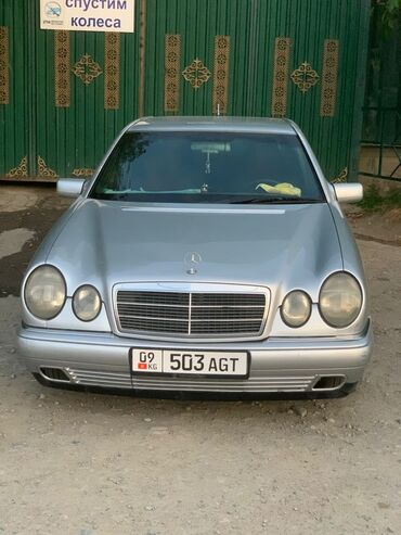 мерседес т 1: Mercedes-Benz E‑Class (W210), седан, серебристый цвет. Кузов и
