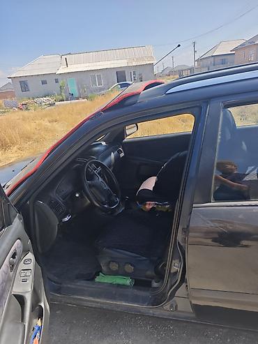 нексия сиденья: Mazda 323: 1998 г., 1.8 л, Механика, Бензин, Универсал — 3