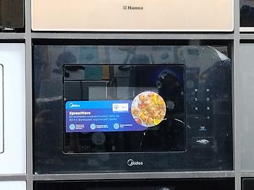Встраиваемая микроволновая печь Midea XpressWave. Объем камеры — 20