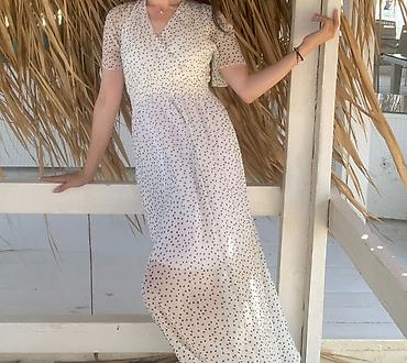 Şəxsi əşyalar: Ağ rəngli, qara xırda ləkəli naxışlı maxi don. - Model: V-yaxa — 1