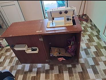 ecemi masaj: Tikiş maşını və qatlanan stol-şkaf komplekti - Elektrik mühərrikli — 2