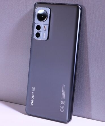 Xiaomi: Xiaomi Mi 12X, 128 ГБ, цвет - Черный, 
 Сенсорный, Отпечаток пальца, Беспроводная зарядка