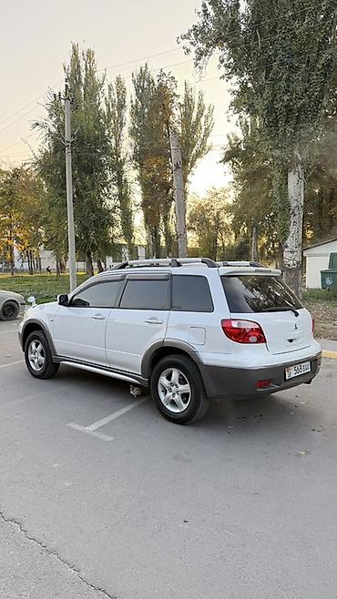 фары на митсубиси: Mitsubishi Airtrek: 2004 г., 2.4 л, Автомат, Газ, Кроссовер — 4