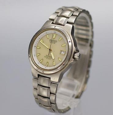 Аксессуары: Seiko Solar Titan saat - Model: Seiko Solar, kalibr 5K25 (arka — 1