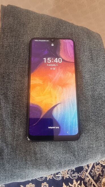 imtahan ucun qulaqciq: Samsung Galaxy A50, rəng - Qara, Barmaq izi