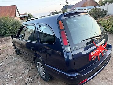 боковые: Toyota Corolla: 2000 г., Механика, Универсал — 2